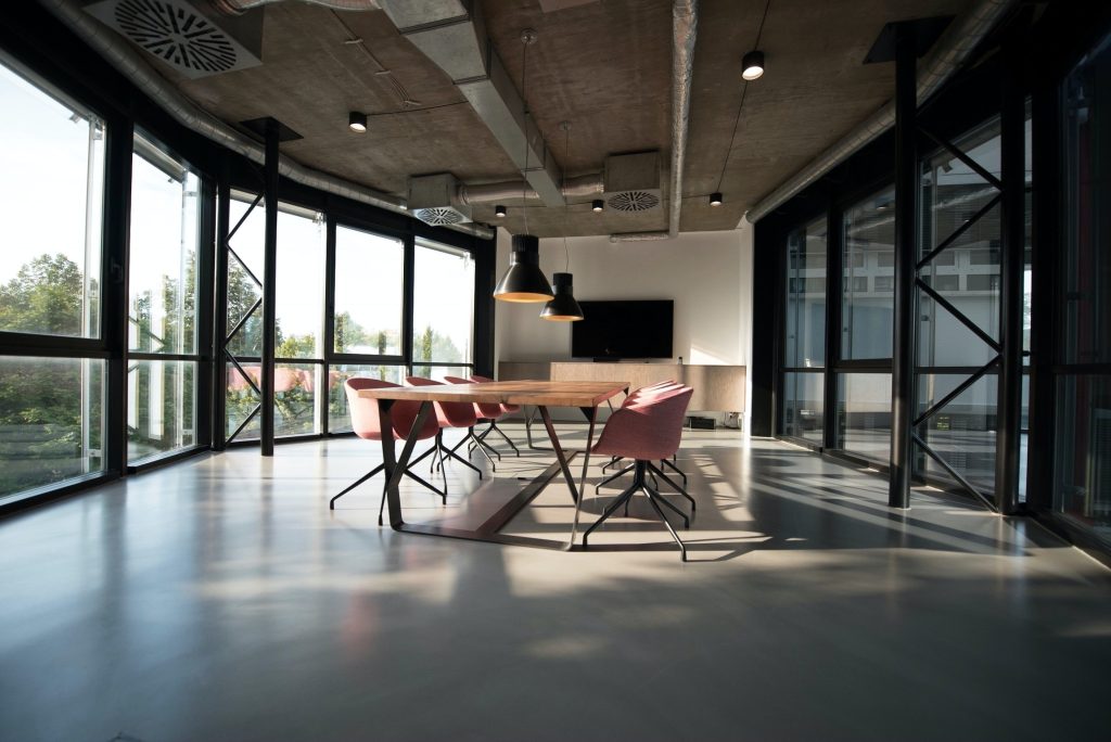 office with chairs next to windows, ready for clients